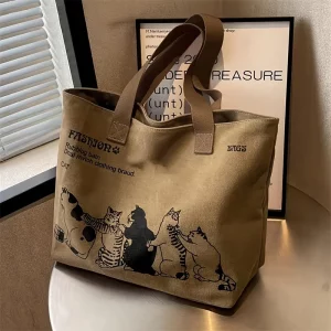Buy Women's Canvas Tote Bag Fashionable Spacious Durable Shoulder Bag with Zipper Closure and Classic Design Perfect for Work in Ghana.
