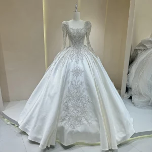 Buy Luxurious Wedding Dress with Sparkling Embellishments and Long Trains Delicate Lace Embroidery Long Sleeves Bridal Gown in Ghana.